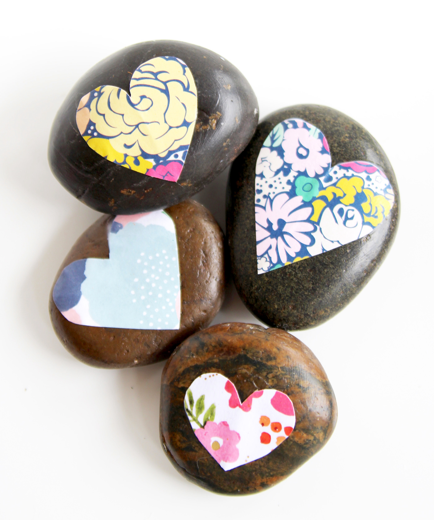 decorate stones with Mod Podge and paper