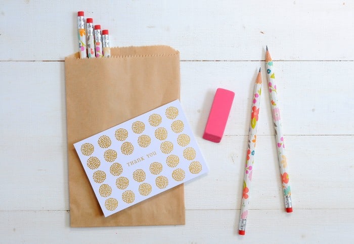 personalized pencils with a brown paper bag, eraser, and thank you card