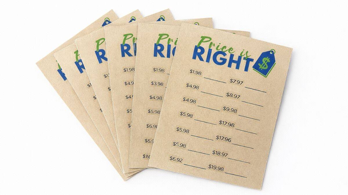 Stack of printed Price Is Right baby shower game cards with lines for guessing the cost of items in a fun party guessing game.