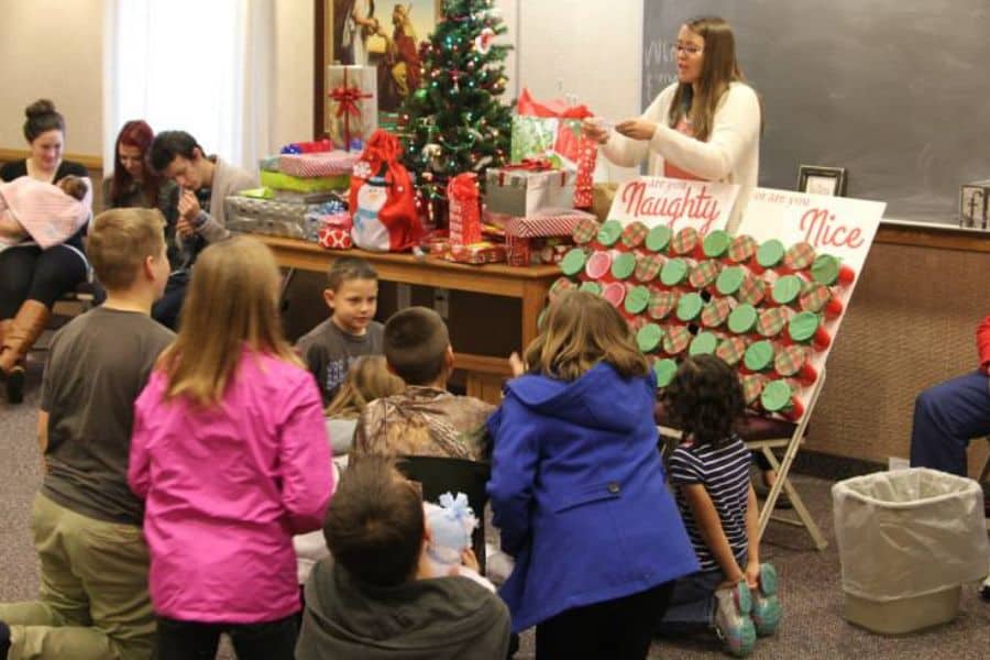 A family playing the Naughty or Nice Christmas Game.