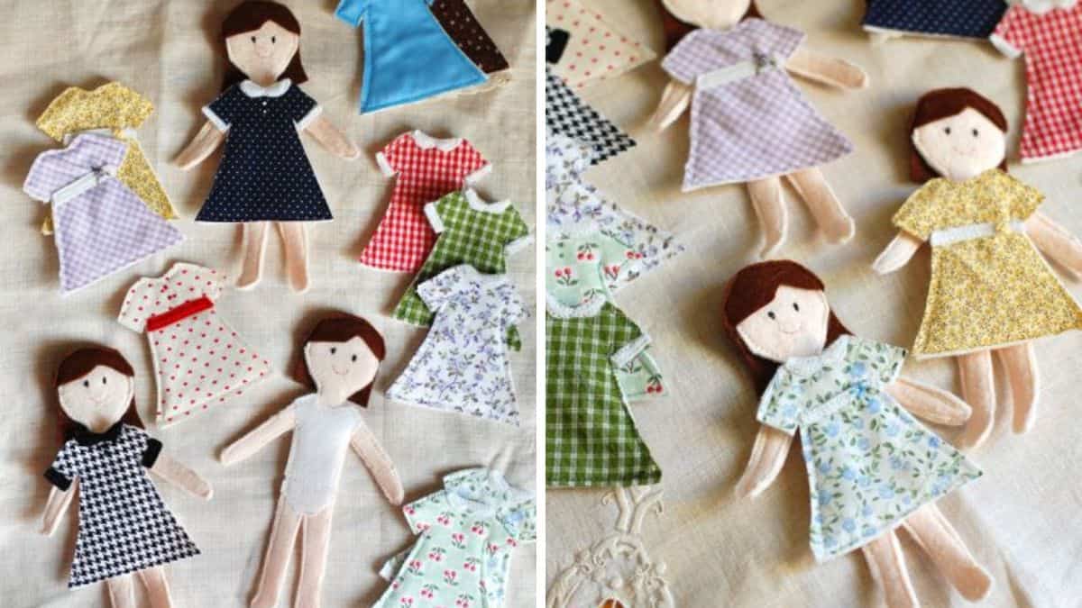 Handmade felt paper dolls arranged on fabric, each with removable fabric dresses in different patterns and styles laid out beside them.