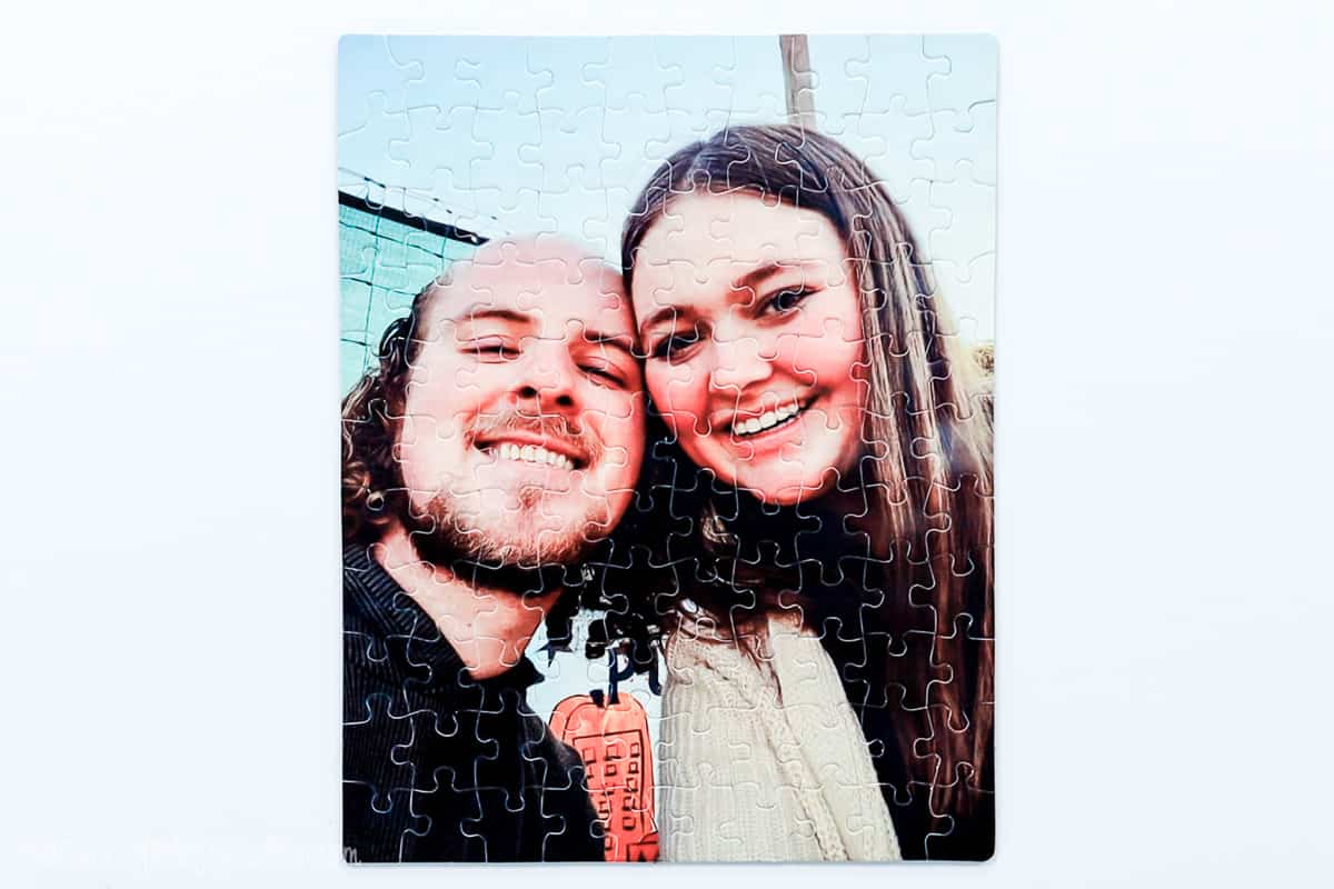 Finished custom photo puzzle of a girl and a boy.